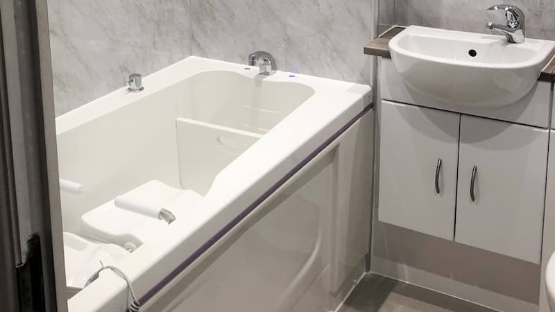 white bath with disabled access