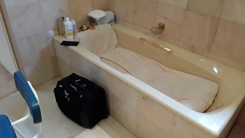 bath with golden handles